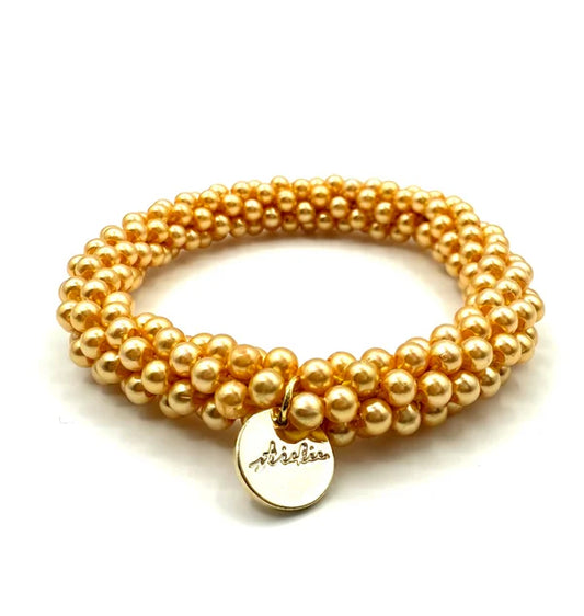 Stiekie gold pearl